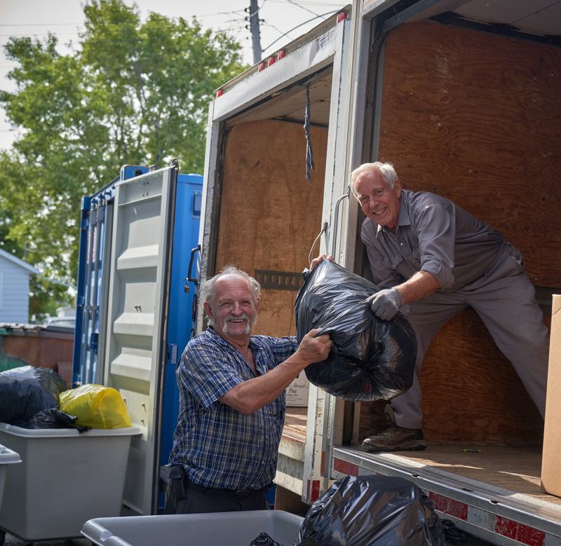 men collecting donations
